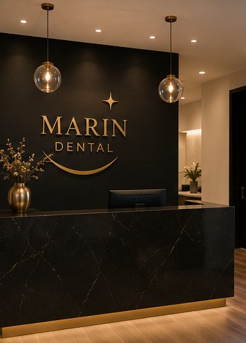 The Marin Dental reception in black and gold